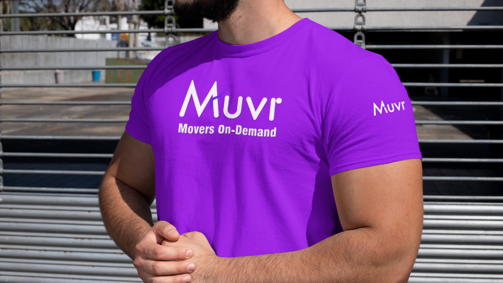 Muvr - t-shirt-mockup-of-a-strong-bearded-man-at-a-parking-lot-31483